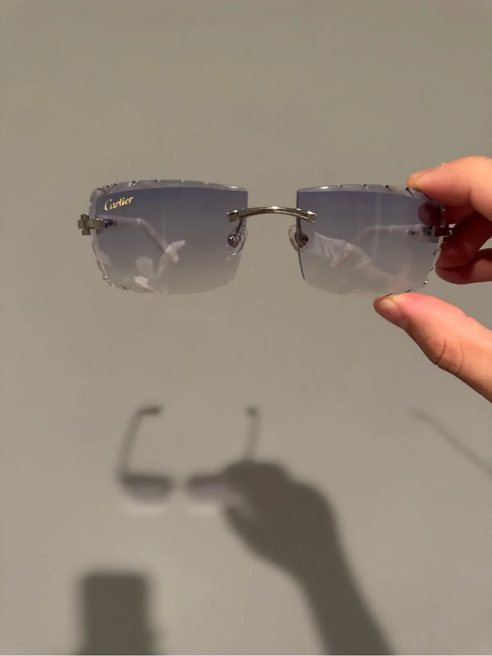 Cartier Rimless Sunglasses with White Marble Temples and Gradient Purple Lenses
